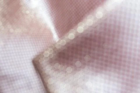 Texture of the fabric, side, background of fabric in the highlight. 库存照片
