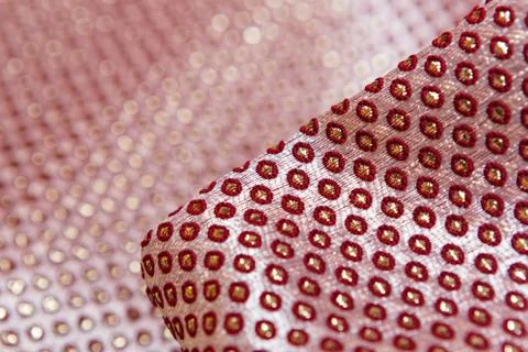 Texture of the fabric, side, background of fabric in the highlight. golden color Stock Photos