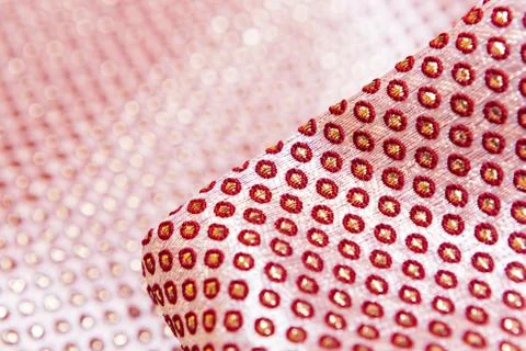 Texture of the fabric, side, background of fabric in the highlight. golden color Stock Photos