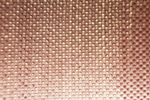 Texture of the fabric, side, background of fabric in the highlight. golden co Stock Photos
