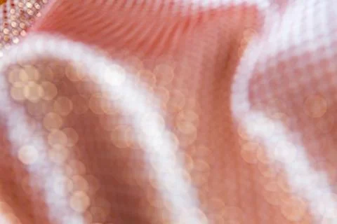 Texture of the fabric, side, background of fabric in the highlight. golden co Stock Photos