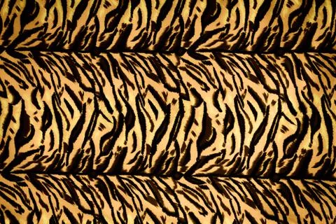 Texture fabric of tiger for background Stock Photos
