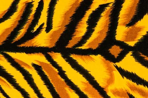 Texture fabric of tiger for background Stock Photos