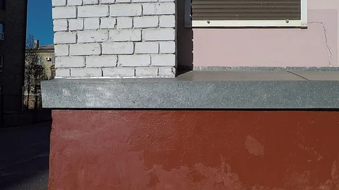 Texture  facade of the building painted wall of red color Stock Footage 128319598