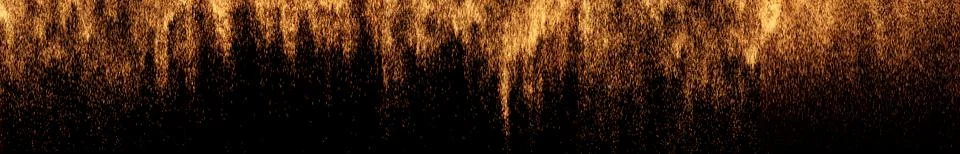 The texture of the fall of gold particles Stock Photos