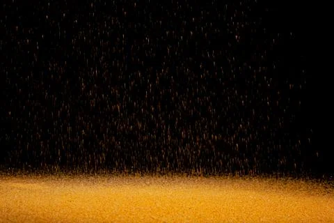 The texture of the fall of gold particles Stock Photos