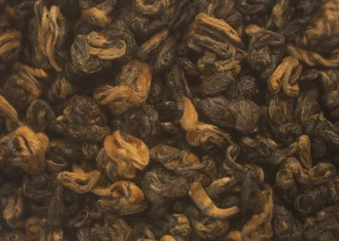 Texture of fermented red tea leaves, selective focus Stock Photos