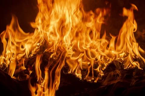 Texture of fire on black background. Abstract fire flame background. Large .. Stock Photos