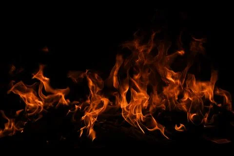 Texture of fire on a black background. Abstract fire flame background, large Stockfoto's