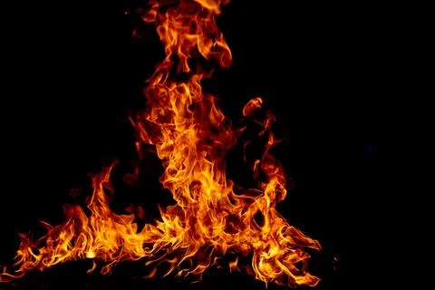Texture of fire on a black background. Abstract fire flame background, large Stockfoto's