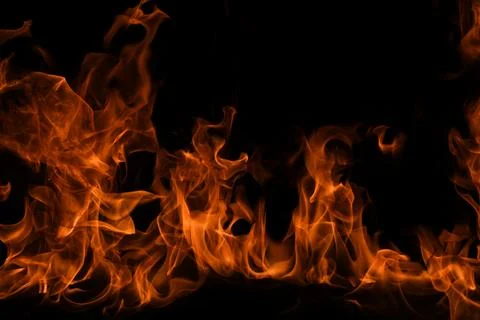 Texture of fire on a black background. Abstract fire flame background, large Stockfoto's