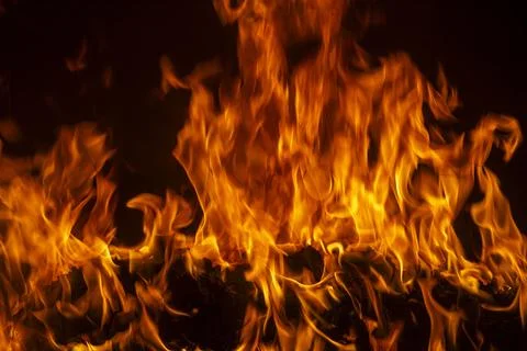 Texture of fire on black background. Hell bonfire. Texture of fire on a bla.. Stock Photos