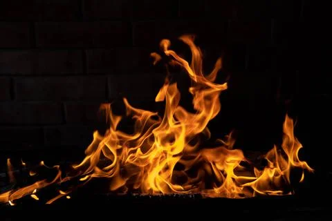 The texture of the fire is close, red and yellow, thermal energy at the fuel Stock Photos