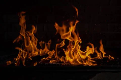 The texture of the fire is close, red and yellow, thermal energy at the fuel Stock Photos