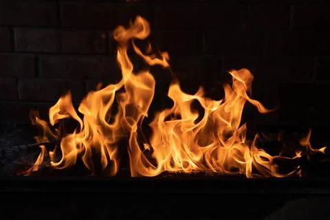 The texture of the fire is close, red and yellow, thermal energy at the fuel Stock Photos