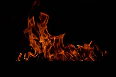 The texture of the fire is close, red and yellow, thermal energy at the fuel Stock Photos