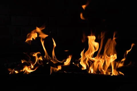 The texture of the fire is close, red and yellow, thermal energy at the fuel Stock Photos