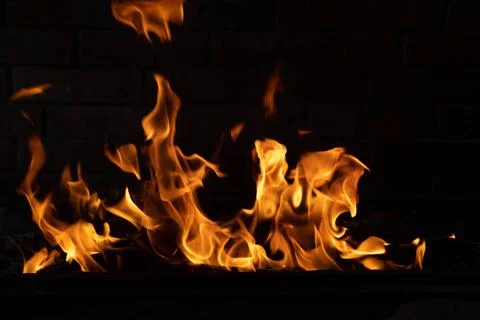 The texture of the fire is close, red and yellow, thermal energy at the fuel Stock Photos