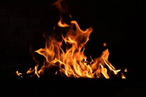 The texture of the fire is close, red and yellow, thermal energy at the fuel Stock Photos