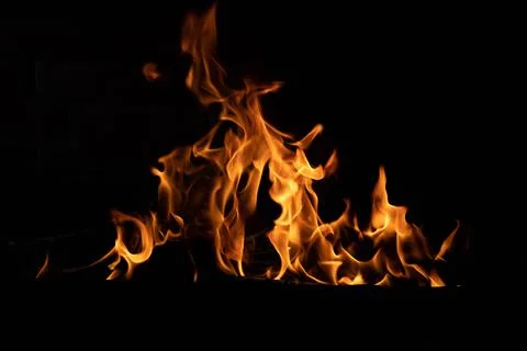 The texture of the fire is close, red and yellow, thermal energy at the fuel Stock Photos