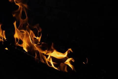 The texture of the fire is close, red and yellow, thermal energy at the fuel Stock Photos