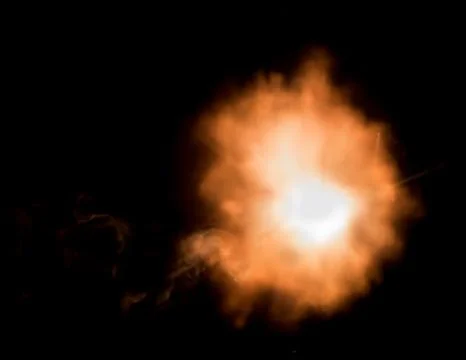 The texture of a firearm shot , a bright flash of flame on a black background Stock-Fotos