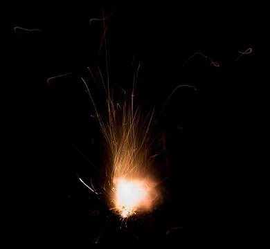 The texture of a firearm shot , a bright flash of flame on a black background Foto stock