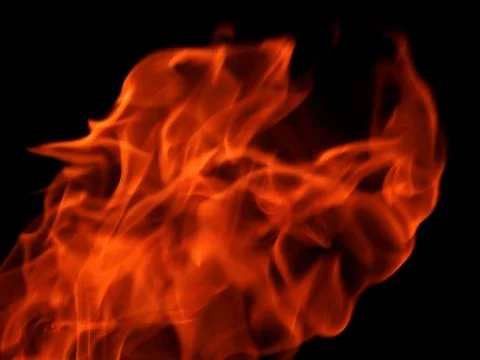 The texture of a flame of fire on a black background Stock Photos