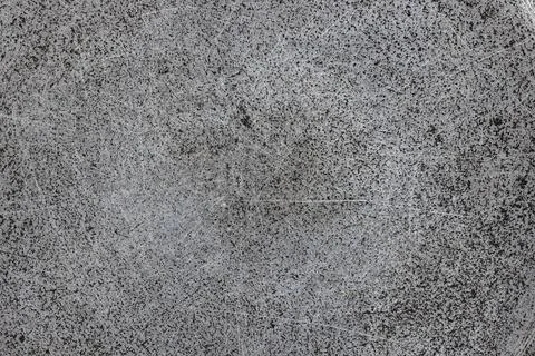 Texture of flat cast iron surface with scratches and black stains 库存照片