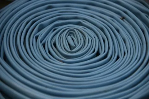 The texture of the folded blue fabric. Foto stock