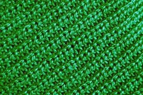 The Texture of Forest Green Knitted Wool Fabric in Diagonal Patterns Foto stock