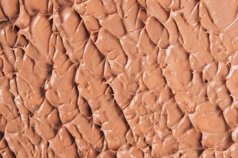 The texture of the foundation is beige under the make-up Stock Photos