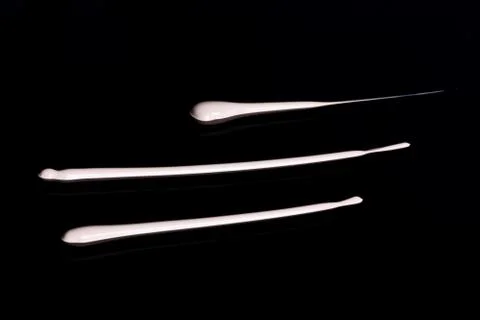 The texture of a foundation liquid. Black background. Foto stock