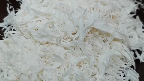 Texture of freshly shredded white coconut meat. Stock Footage 340506378