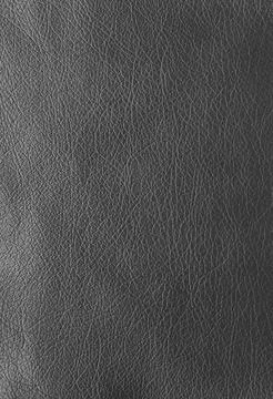 Texture of genuine leather, artificial leatherette black background Stock Photos