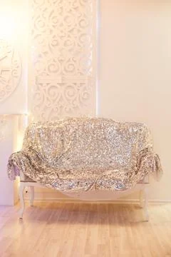 Texture glitter sequins silver sofa. Beautiful rich interior. silver sofa Stock Photos
