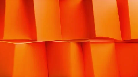 Texture of glossy plastic in a vibrant orange color, with a slightly padded Видео 253925312
