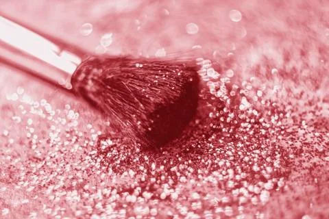 Texture of gold glitter on the makeup brush Stock Photos
