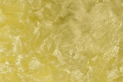 Texture of golden decorative plaster or concrete. Abstract gold grunge back.. Stock Photos