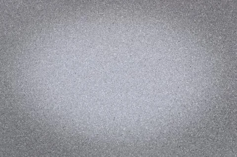 Texture of granite gray color with small dots, with vignetting, use backgroun Stock Photos
