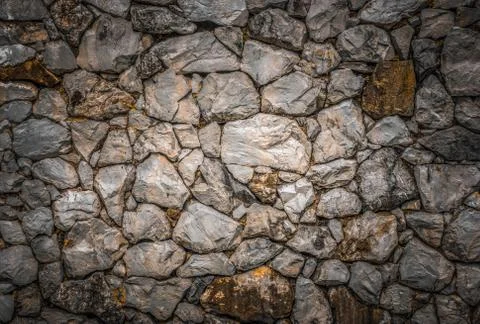 Texture of granite stone wall surface Stock Photos