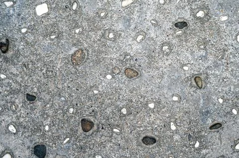 Texture of gray asphalt with stone. Sidewalk background Stock Photos