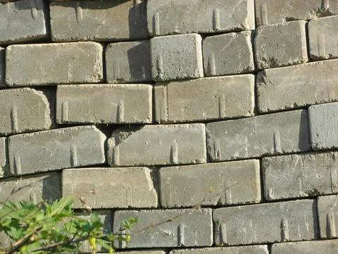 Texture of a gray brick wall, close-up photo Stock Photos