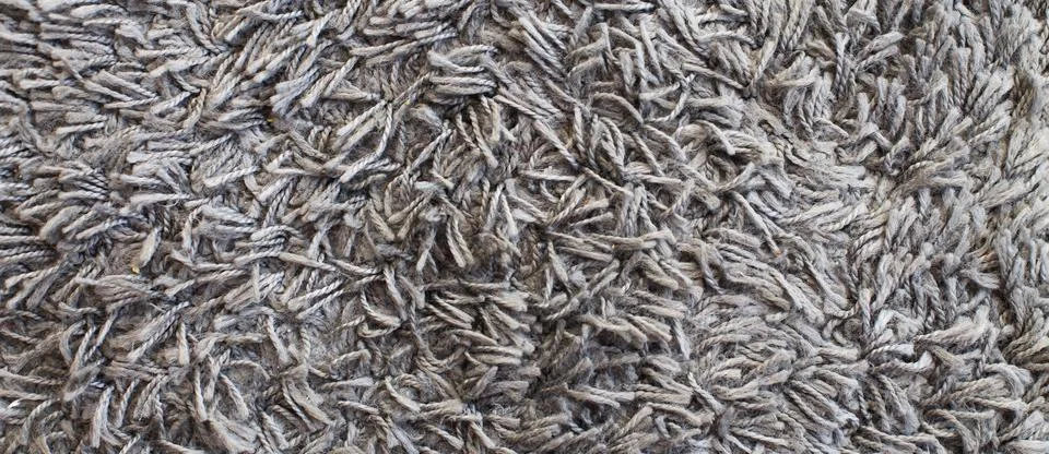The texture of gray carpet. Fleecy surface background 스톡 사진