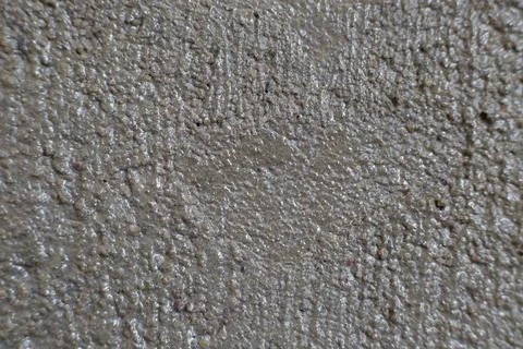 The texture of gray concrete made of cement in close - up is a good backgroun Stock Photos