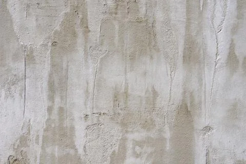 The texture of a gray concrete wall. The background of old cement plaster. Gr Stock Photos