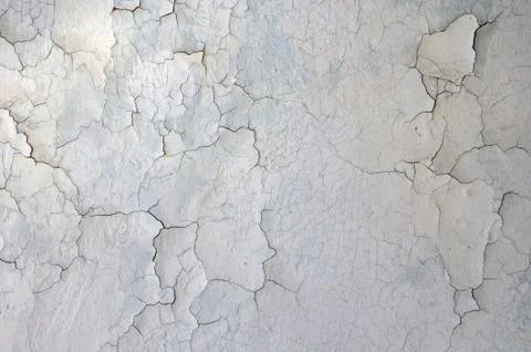 Texture of a gray cracked wall. old dry background Stock Photos