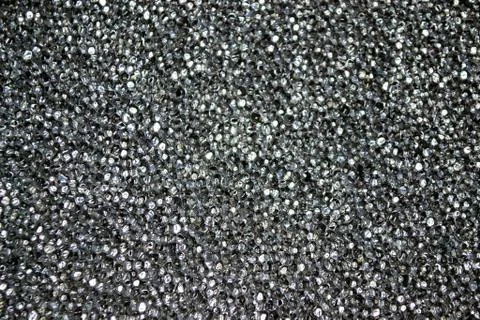 Texture of a gray foam rubber close up view. Shot of black bumpy material wit Stock Photos
