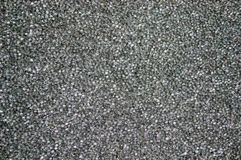 Texture of a gray foam rubber close up view. Shot of black bumpy material wit Foto stock