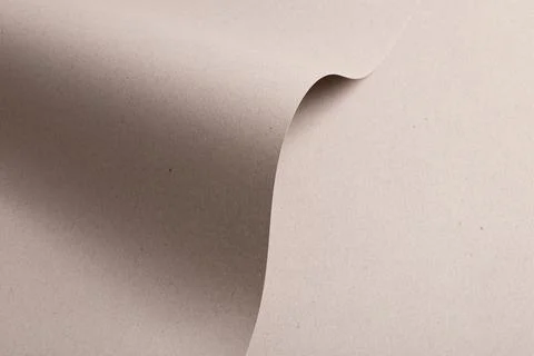 Texture with gray, greige, beige backdrop. Paper with wave fold, pastel abs.. Stock Photos